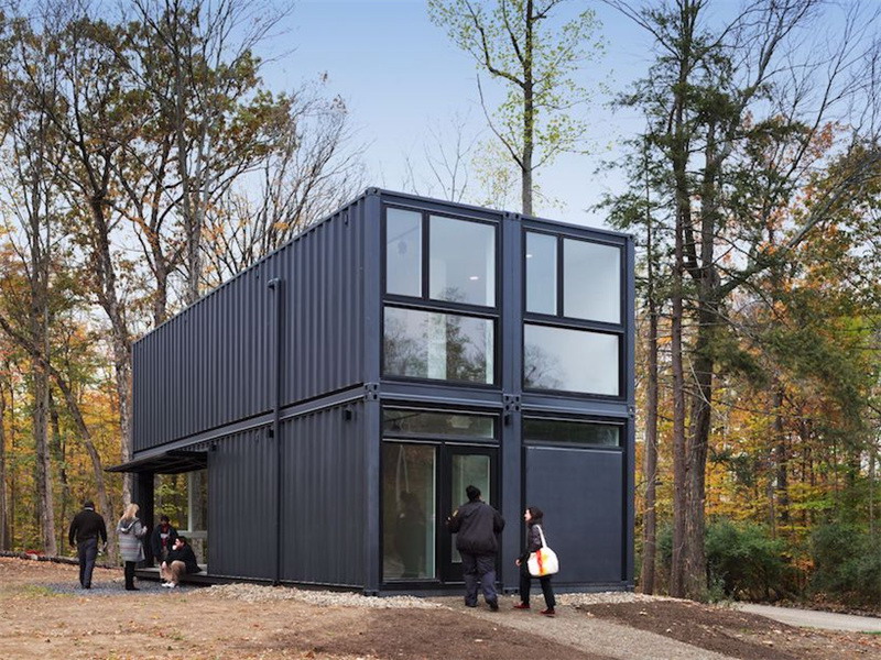 Container House | Four-square grid spells out high ceilings and opens the