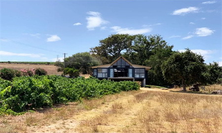 Container Home | The perfect example of extending an old building! Old and new merge in a gabled roof